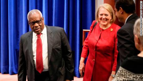 What does Ginny Thomas' texts refer to as Justice Thomas?  In the Supreme Court, it was him.