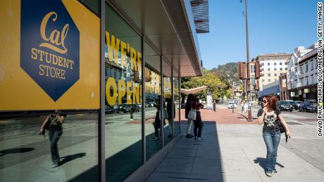 A person walks past the student store on the University of California, Berkeley. 