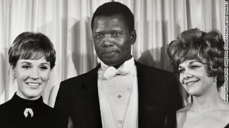 Julie Andrews, Sidney Poitier and Estelle Parsons at the 1968 Academy Awards.  Poitier had attended Martin Luther King Jr.'s funeral the day prior.