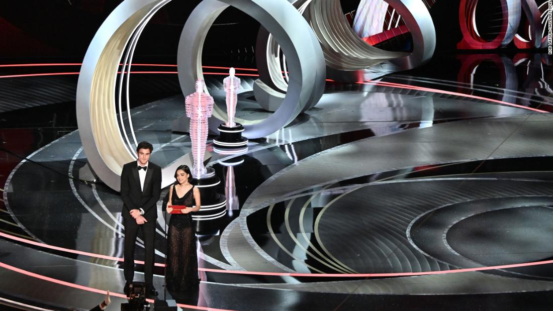 Jacob Elordi and Rachel Zegler present an award during the show. There was a backlash earlier this month when Zegler, the star of &quot;West Side Story,&quot; shared that she hadn&#39;t been invited to the show. &quot;I never thought that I would be here six days ago,&quot; &lt;a href=&quot;https://www.cnn.com/entertainment/live-news/oscars-2022/h_67f07c31e474f5ea26d63d9d190cfc46&quot; target=&quot;_blank&quot;&gt;she joked.&lt;/a&gt; &quot;We did it. Dreams really can come true, pretty fast, too.&quot;