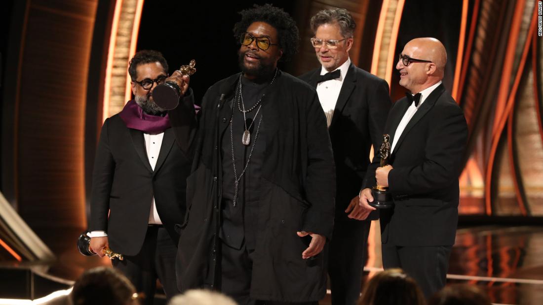 Ahmir &quot;Questlove&quot; Thompson accepts the Oscar for best documentary feature. The Roots drummer directed &quot;Summer of Soul (...Or, When the Revolution Could Not Be Televised).&quot;