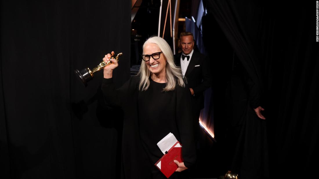 &quot;Power of the Dog&quot; director Jane Campion walks backstage after winning the Oscar for best director.