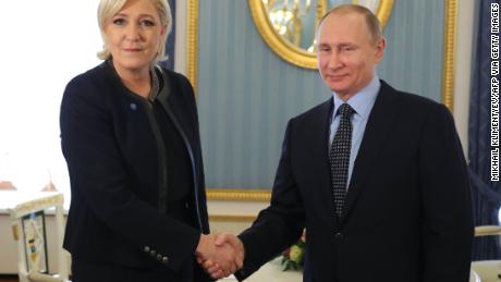 Russian President Vladimir Putin meets Marine Le Pen at the Kremlin in Moscow on March 24, 2017. 