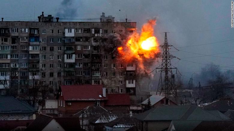 Russian forces fire at an apartment building in Mariupol, Ukraine on March 11, 2022.