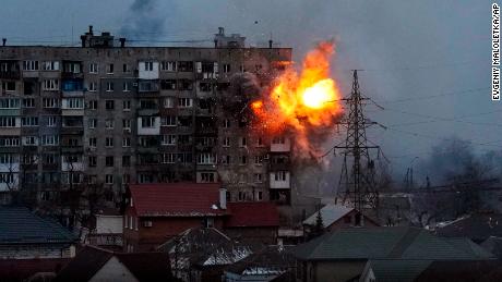 Russian forces fire at an apartment building in Mariupol, Ukraine on March 11, 2022.