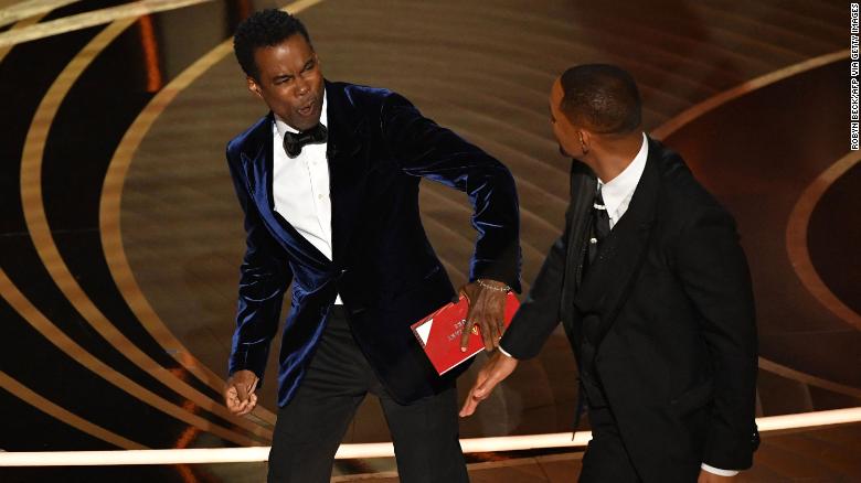 Chris Rock and Will Smith on stage at the Oscars in March.