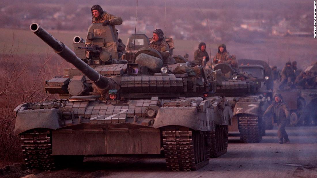 An armored convoy of pro-Russian troops travel on a road leading to Mariupol on March 28.