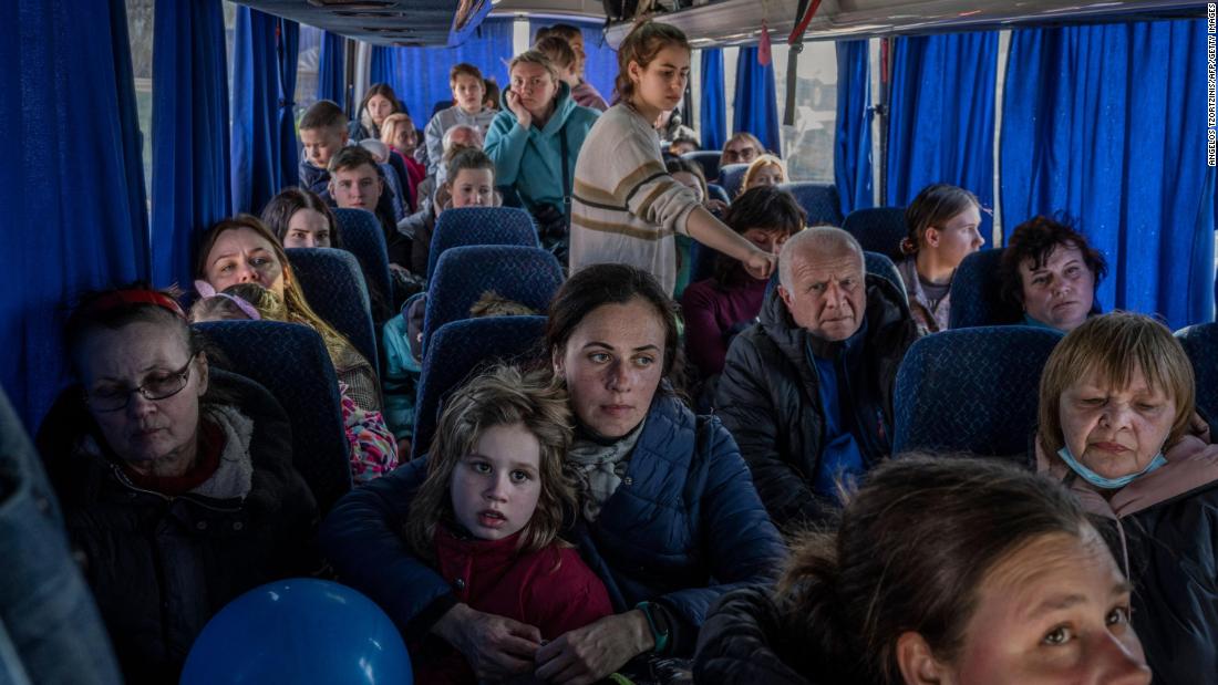 Ukrainian evacuees ride on a bus at the Medyka border crossing in southeastern Poland on March 28.