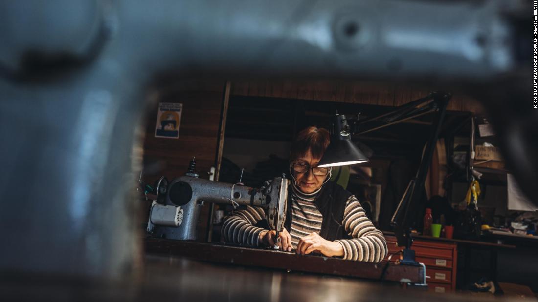 A volunteer weaves a bulletproof vest in Zaporizhzhia, Ukraine, on March 28.