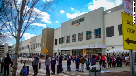 Amazon workers at New York warehouse vote to form company&#39;s first US union