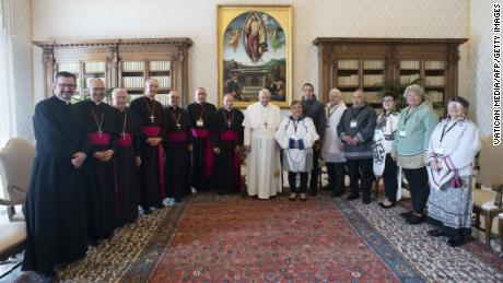 Pope Francis, center, met representatives of Canada&#39;s Inuit people, including survivors of residential schools, at the Vatican Monday. 