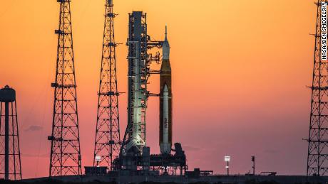 The Artemis I rocket stack can be seen at sunrise on March 21 at Kennedy Space Center in Florida. 