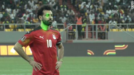 Mohamed Salah had lasers pointed in his face as he took a penalty. 