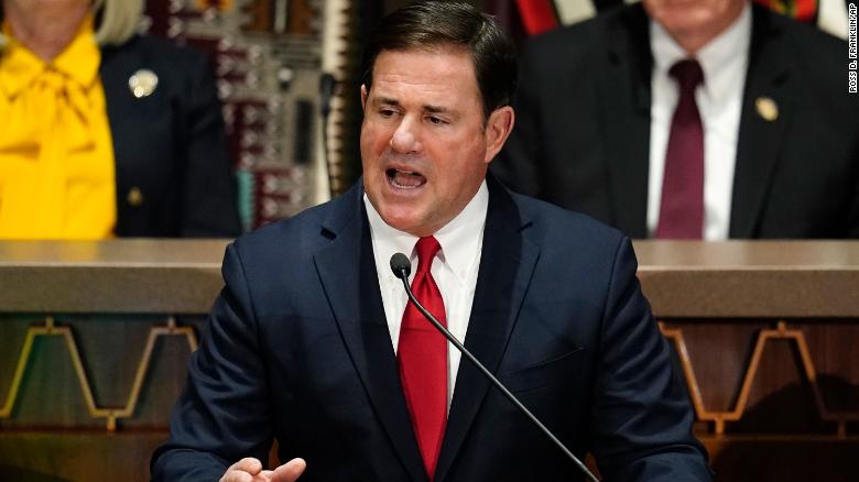 Arizona governor signs bill outlawing gender-affirming care for transgender youth and approves anti-trans sports ban