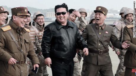 This picture from North Korean state media, allegedly taken on March 24, shows leader Kim Jong Un walking with North Korean military personnel during the test launch of a new type of ICBM.