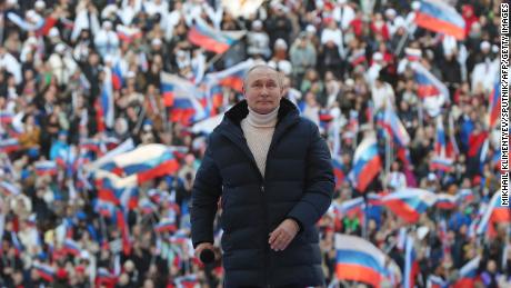 Russian President Vladimir Putin speaks at a celebration marking the eighth anniversary of Russia&#39;s annexation of Crimea at the Luzhniki stadium in Moscow on March 18, 2022. 