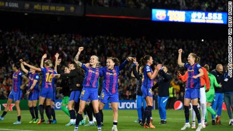 Barcelona&#39;s players celebrate at the end of the women&#39;s UEFA Champions League quarterfinal.