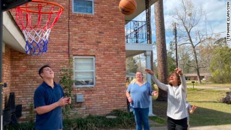 Brazdovic shoots hoops with her grandsons and daughter-in-law.