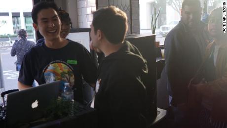Axie Infinity Co-founder Jeff &quot;The Jiho&quot; Zirlin, center, greets  Albert &quot;Aruchan&quot; Takagi, left, at the Axie Infinity NFT LA party.
