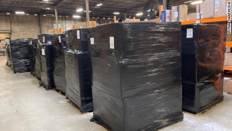 Packages of protective equipment being prepared for shipment in a Meest-America, Inc. warehouse. 