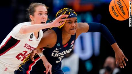 Stanford&#39;s Lacie Hull and UConn&#39;s Aaliyah Edwards go after a loose ball during the second half of the Women&#39;s Final Four NCAA tournament semifinal Friday in Minneapolis. 
