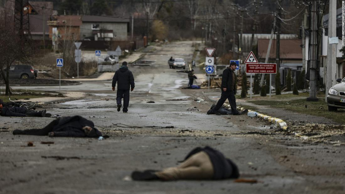 Bodies lie on a street in Bucha on April 2. Images captured by Agence France-Presse showed at least 20 civilian men dead.