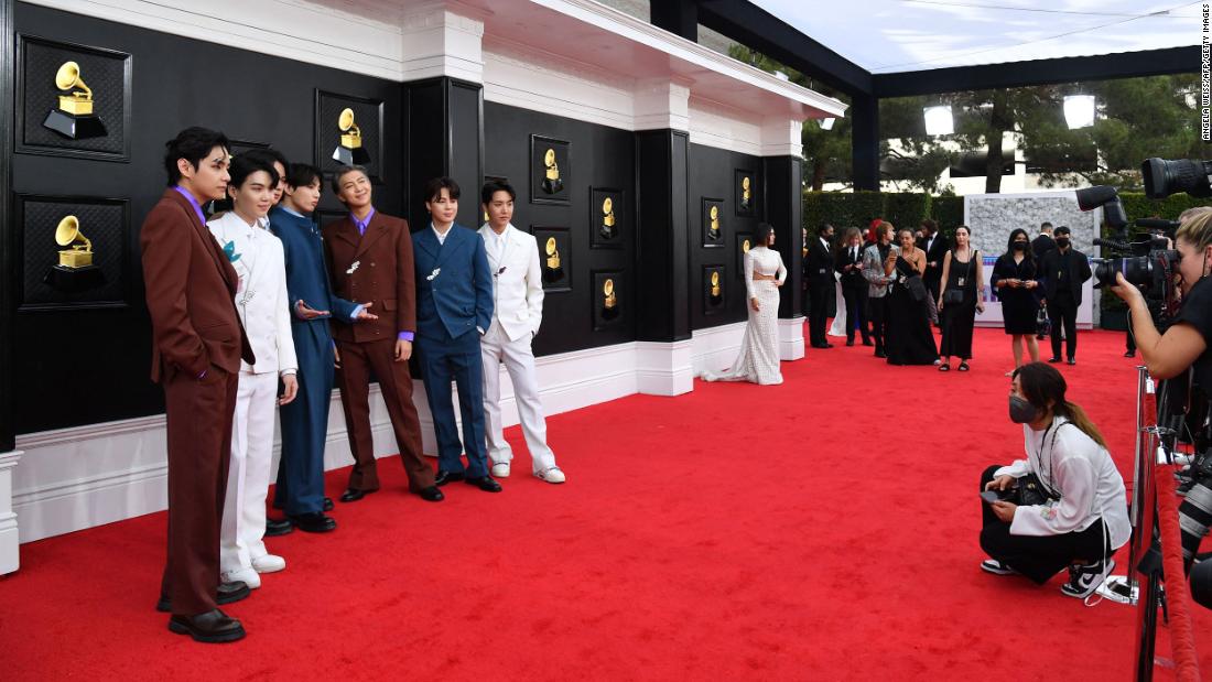 BTS poses on the red carpet before the show. &lt;a href=&quot;http://www.cnn.com/style/article/2022-grammys-red-carpet-fashion/index.html&quot; target=&quot;_blank&quot;&gt;See more red carpet photos.&lt;/a&gt;