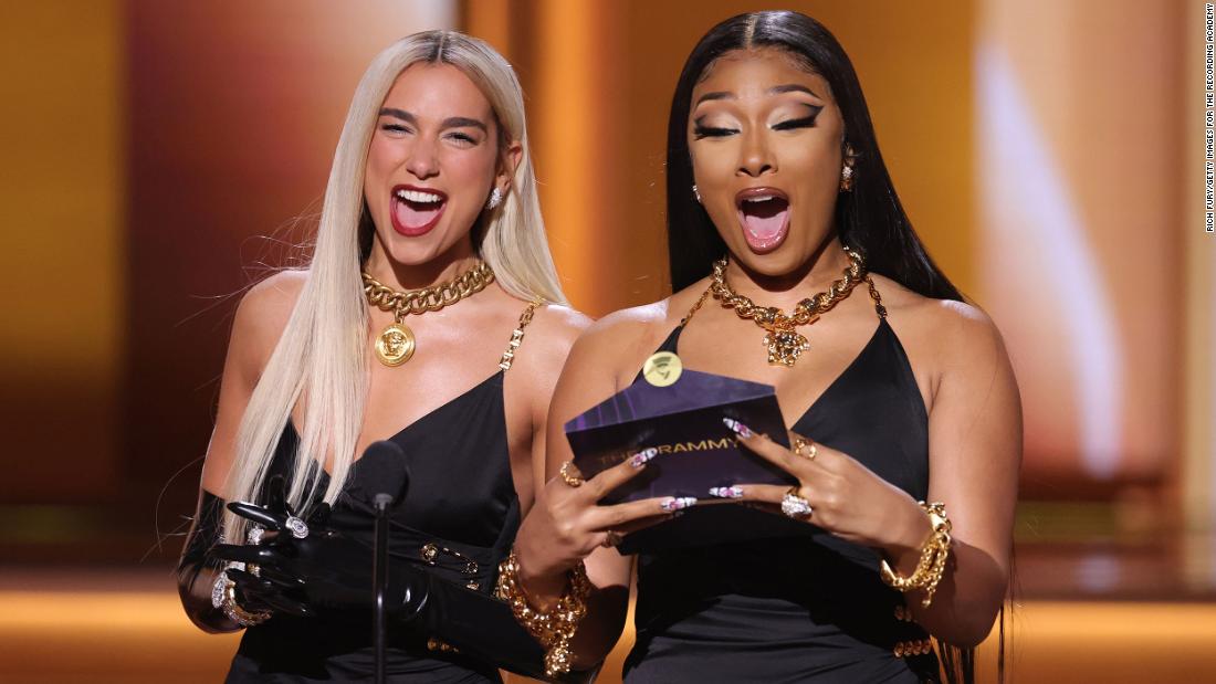 Dua Lipa, left, and Megan Thee Stallion present an award during the show.