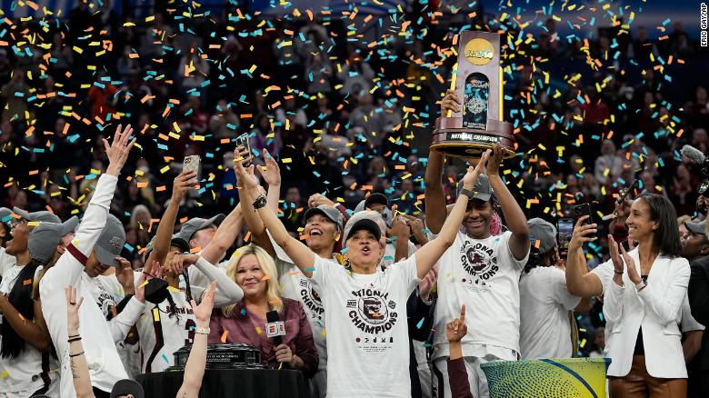 South Carolina head coach Dawn Staley celebrates with her team after winning the NCAA women's basketball championship Sunday in Minneapolis. 