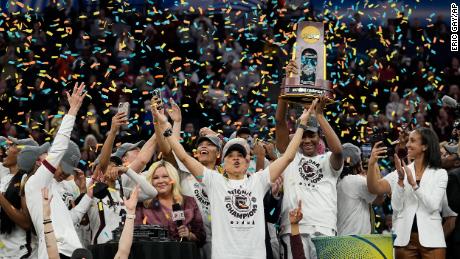 South Carolina head coach Dawn Staley celebrates with her team after winning the NCAA women&#39;s basketball championship Sunday in Minneapolis. 