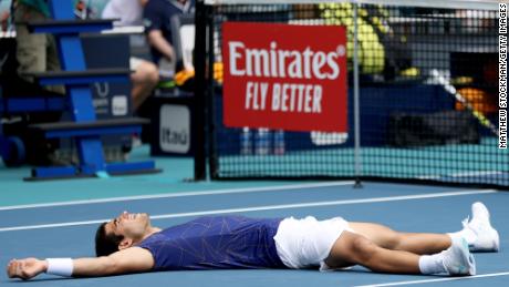 Carlos Alcaraz celebrates after beating Casper Ruud to win the Miami Open.