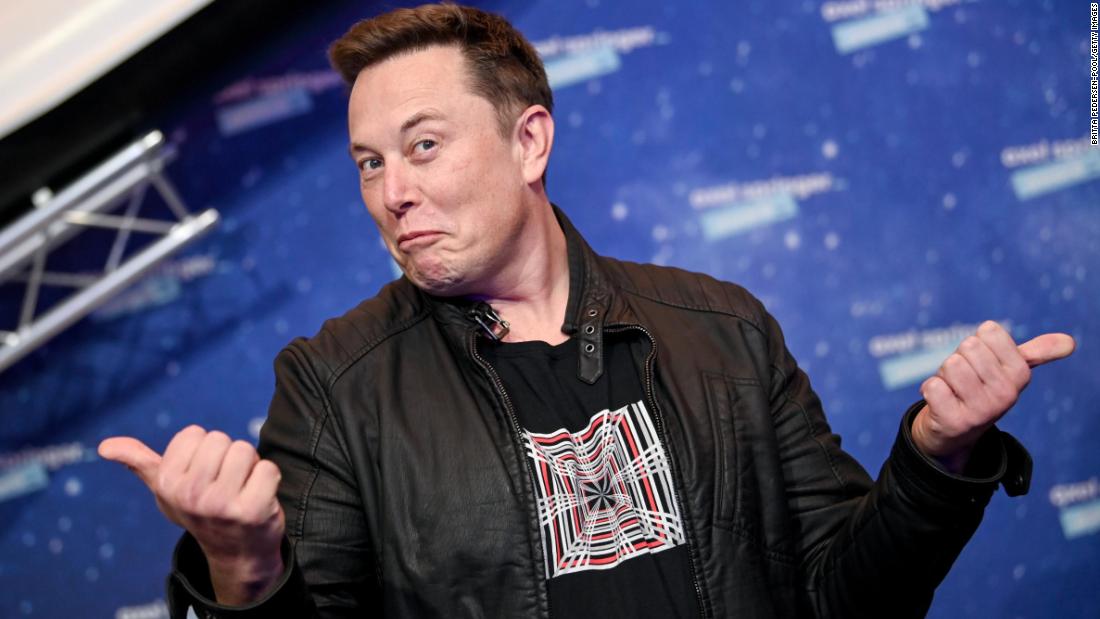 Musk poses on the red carpet before receiving the Axel Springer Award in Berlin in December 2020.