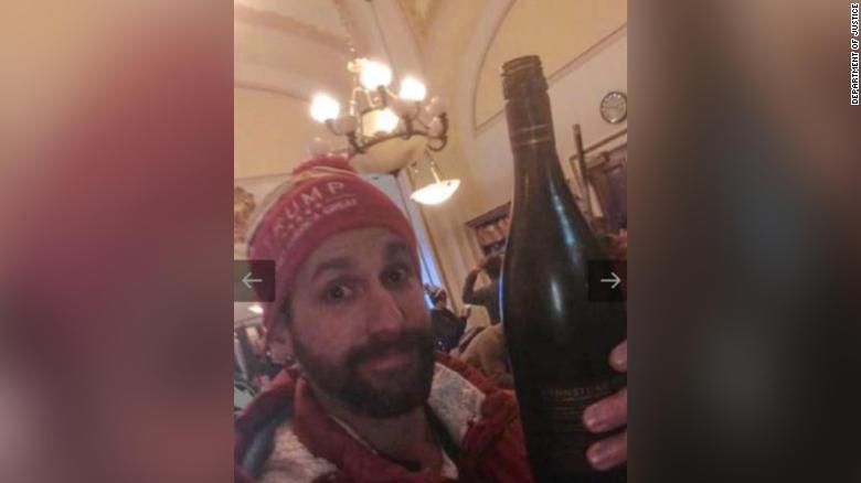 Man photographed ‘chugging wine’ in the US Capitol on January 6 sentenced to jail time