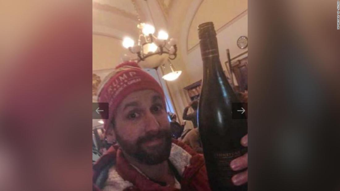 Man photographed 'chugging wine' in the US Capitol on January 6 sentenced to jail time