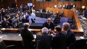 WASHINGTON, DC - APRIL 4: Sen. Cory Booker (D-NJ) talks with Sen. Chris Coons (D-DE), Sen. Patrick Leahy (D-VT), Sen. Richard Blumenthal (D-CT) and committee chairman Sen. Dick Durbin (D-IL) during a break in a Senate Judiciary Committee business meeting to vote on Supreme Court nominee Judge Ketanji Brown Jackson on Capitol Hill, April 4, 2022 in Washington, DC. A confirmation vote from the full Senate will come later this week. (Photo by Win McNamee/Getty Images).