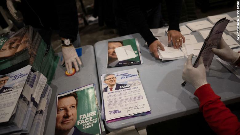 Public servants prepare election materials to be mailed to voters, less than a week out from the first round of France&#39;s presidential vote.