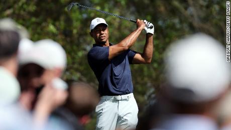 Woods takes a practice swing on the fourth tee during a practice round prior to the Masters. 