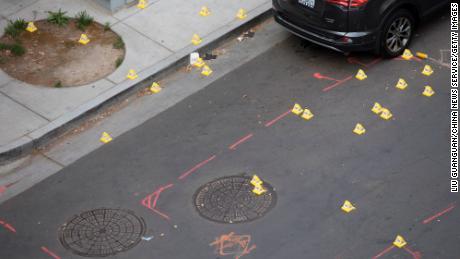 Evidence markers are visible on April 3, 2022, at the scene of mass shooting in Sacramento, California.