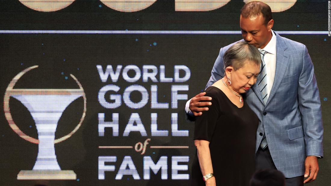 Woods and his mother, Kultida, pose for photos during &lt;a href=&quot;https://www.cnn.com/2022/03/10/golf/tiger-woods-golf-hall-of-fame-spt-intl/index.html&quot; target=&quot;_blank&quot;&gt;his induction into the World Golf Hall of Fame&lt;/a&gt; in March 2022. &quot;I had unbelievable parents, mentors, friends who supported me in the darkest of times and celebrated the highest of times,&quot; he said in his acceptance speech. &quot;All of you allowed me to get here, and I want to say thank you very much from the bottom of my heart.&quot;