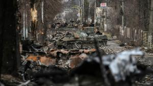 TOPSHOT - This general view shows destroyed Russian armored vehicles in the city of Bucha, west of Kyiv, on March 4, 2022. - The UN Human Rights Council on March 4, 2022, overwhelmingly voted to create a top-level investigation into violations committed following Russia&#39;s invasion of Ukraine. More than 1.2 million people have fled Ukraine into neighbouring countries since Russia launched its full-scale invasion on February 24, United Nations figures showed on March 4, 2022. (Photo by ARIS MESSINIS / AFP) (Photo by ARIS MESSINIS/AFP via Getty Images)