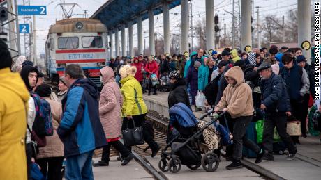 Residents prepare to board trains in Sloviansk on Tuesday, after the Ukrainian government ordered an evacuation.