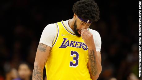 Los Angeles Lakers center Anthony Davis walks to the bench during the defeat.