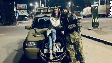 Liuba's sister Juliana delivers supplies to Mikhail on the front lines during his 2014 deployment.