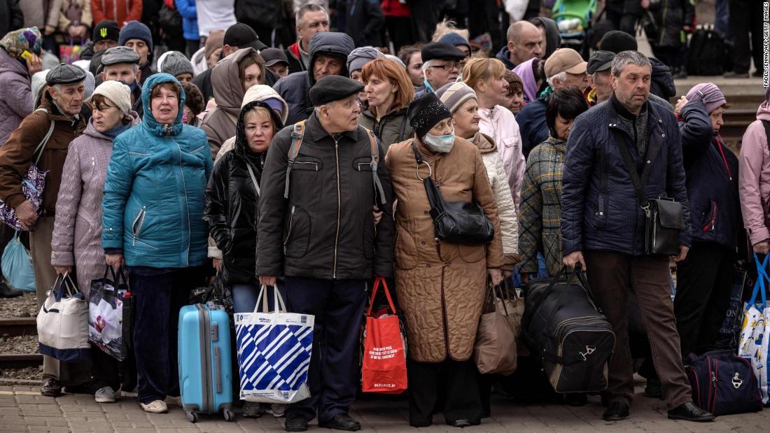 People wait to board a train as they flee Kramatorsk, Ukraine, on April 5.
