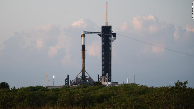 A SpaceX Falcon 9 rocket with the company&#39;s Crew Dragon spacecraft is seen at sunrise on the launch pad at Launch Complex 39A as preparations continue for Axiom Mission 1, on Thursday, April 7, 2022, at NASA&#39;s Kennedy Space Center in Florida. The Ax-1 mission will be the first private astronaut mission to the International Space Station. 