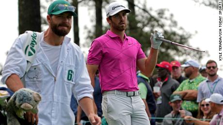 Wolff walks off the fourth tee after breaking his club.