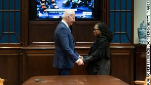 U.S. President Joe Biden holds hands with Ketanji Brown Jackson, associate justice of the U.S. Supreme Court nominee, as the Senate votes on her nomination to the U.S. Supreme Court in the Roosevelt Room of the White House in Washington, D.C., U.S., on Thursday, April 7, 2022. Jackson was confirmed to the U.S. Supreme Court, making history as the first Black woman to ever join its ranks while leaving the ideological balance on the nations highest court unchanged. Photographer: Joshua Roberts/Sipa/Bloomberg via Getty Images