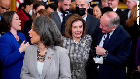 House Speaker Nancy Pelosi works her way through the crowd at an event in the White House on April 5.