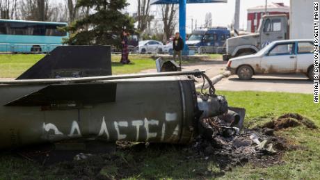 "for children"  A missile is seen written on the side near Kramatorsk railway station.  The video was shared on social media shortly after the attack by Ukraine's President Zelensky.  CNN could not confirm who wrote the words on the missile.