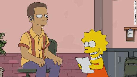 Lisa Simpson with the deaf character Monk Murphy in the episode.